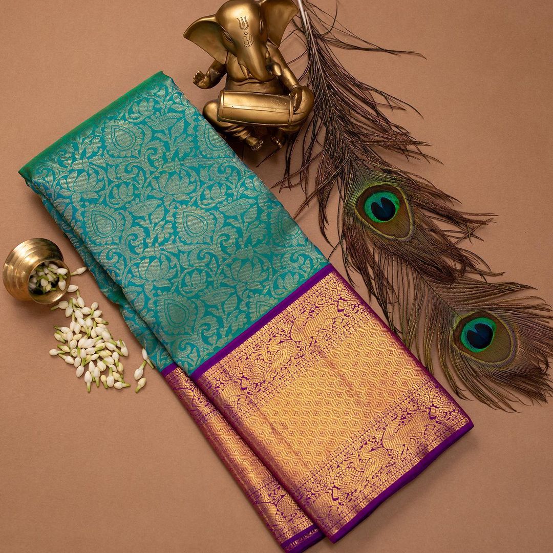 Murmurous Rama Soft Silk Saree With Elision Blouse Piece