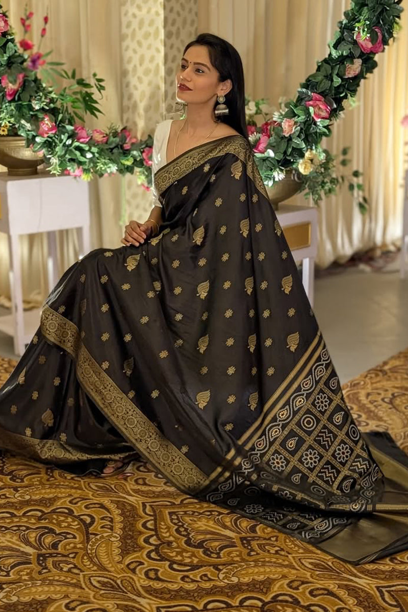 Prettiest Black Soft Silk Saree With Tantalizing Blouse Piece