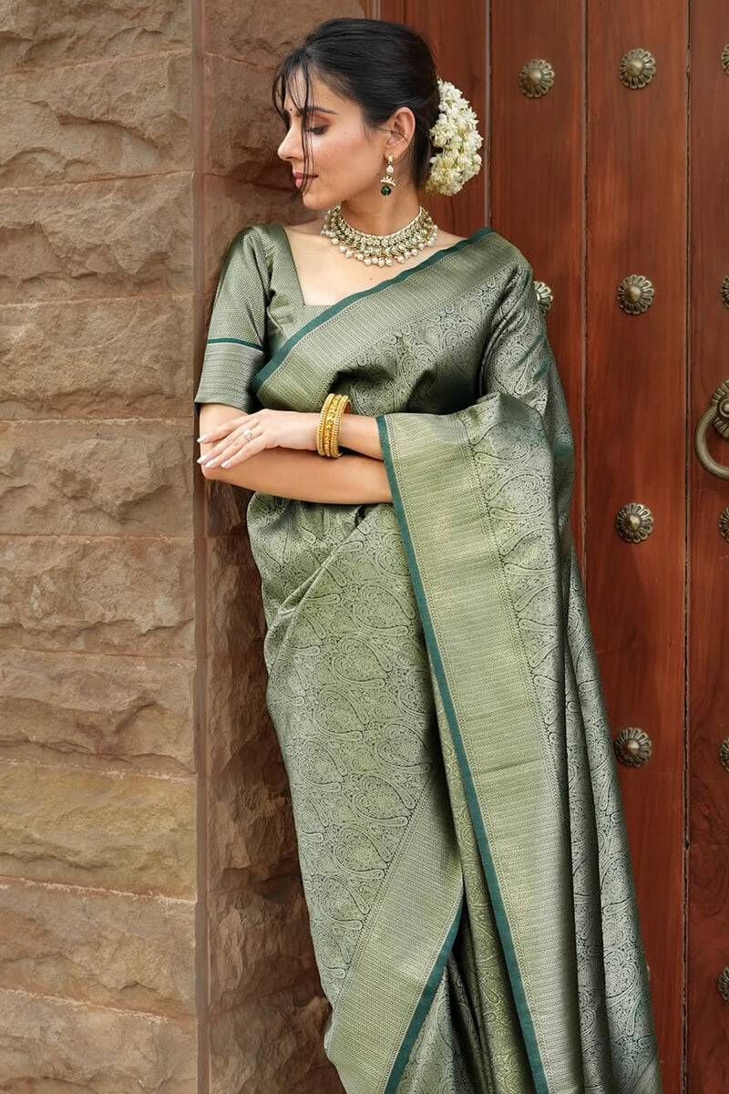 Blissful Dark Green Soft Silk Saree With Sizzling Blouse Piece