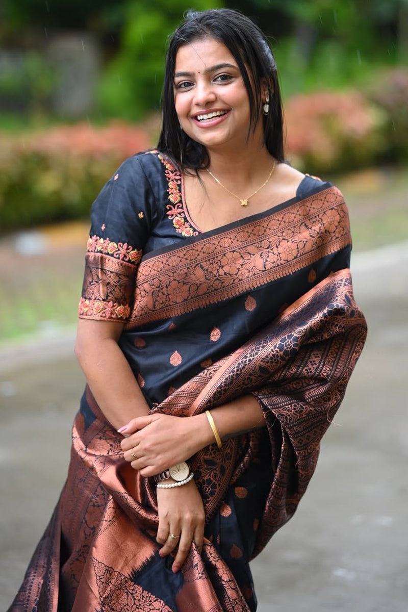 Gleaming Black Soft Silk Saree With Invaluable Blouse Piece