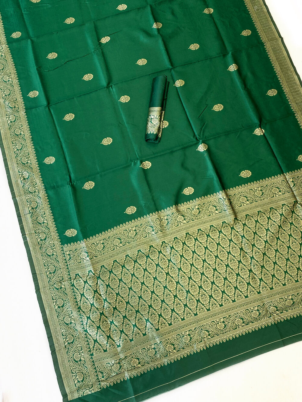 Luminous Green Soft Silk Saree With Cynosure Blouse Piece