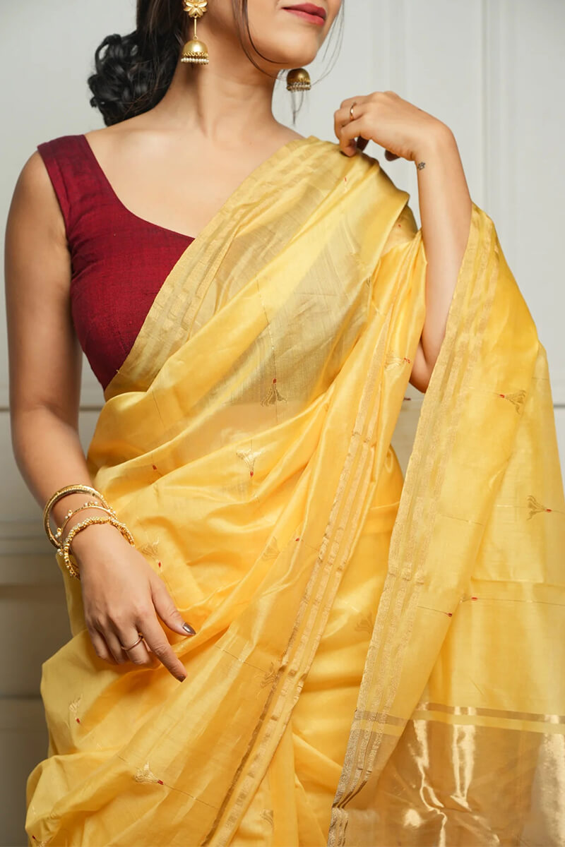 Ravishing Yellow Cotton Silk Saree With Marvellous Blouse Piece