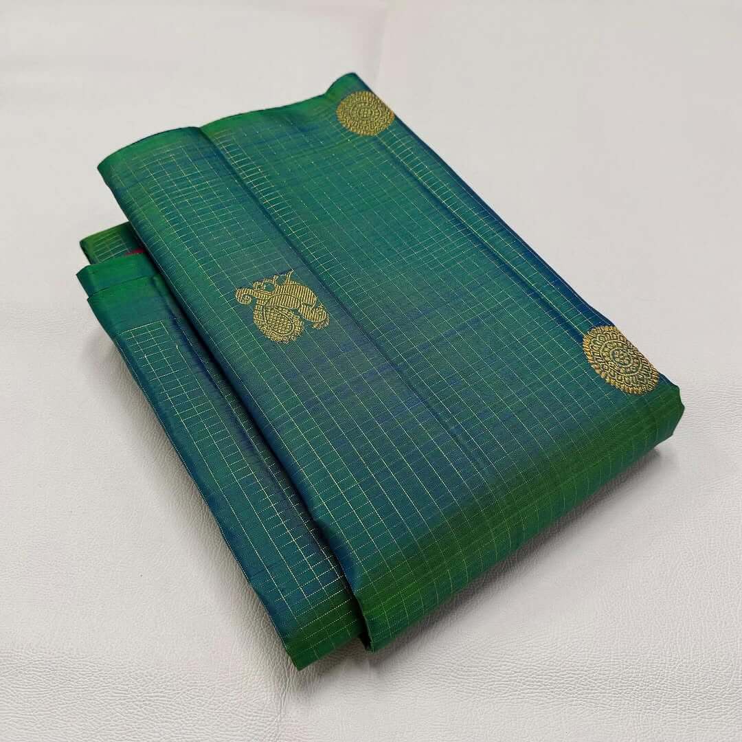 Sumptuous Rama Soft Silk Saree With Surpassing Blouse Piece