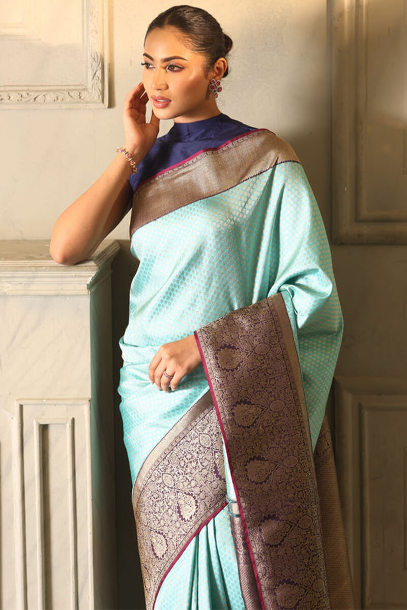 Enigmatic Firozi Soft Silk Saree With Glittering Blouse Piece