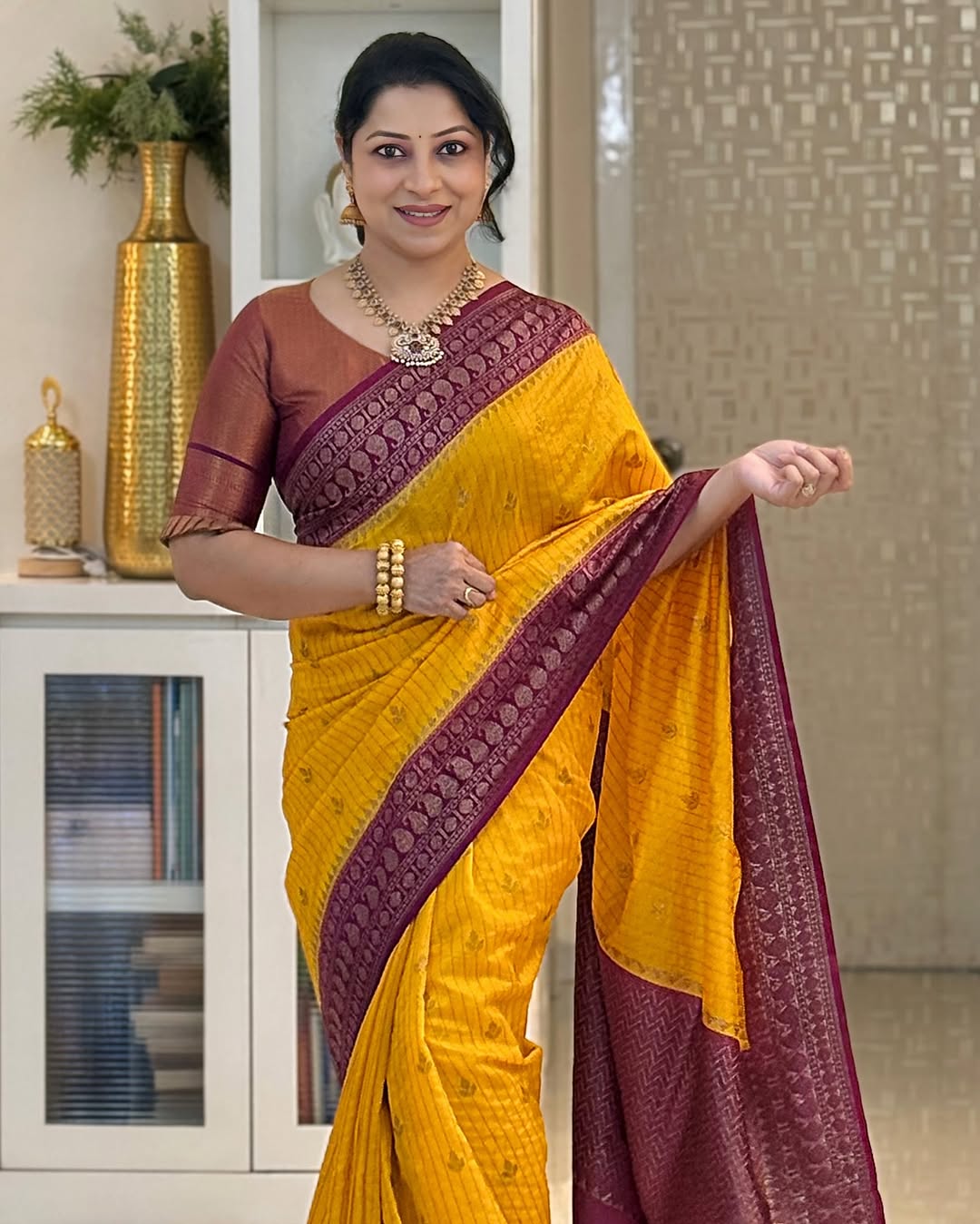 Adorning Yellow Soft Silk Saree With Unique Blouse Piece