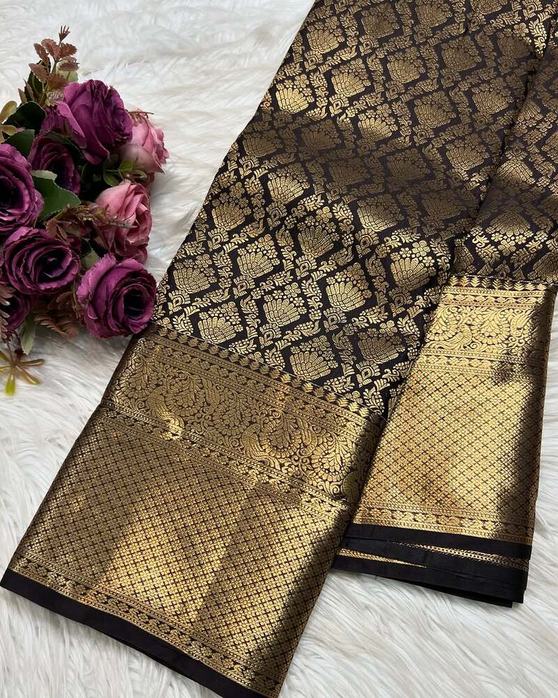 Sizzling Black Soft Banarasi Silk Saree With Alluring Blouse Piece