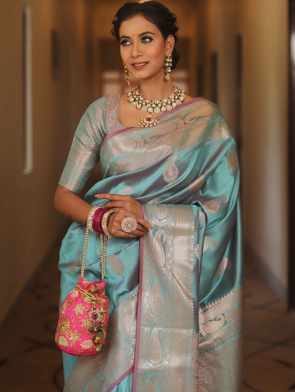 Scintillating Firozi Soft Banarasi Silk Saree With Preferable Blouse Piece