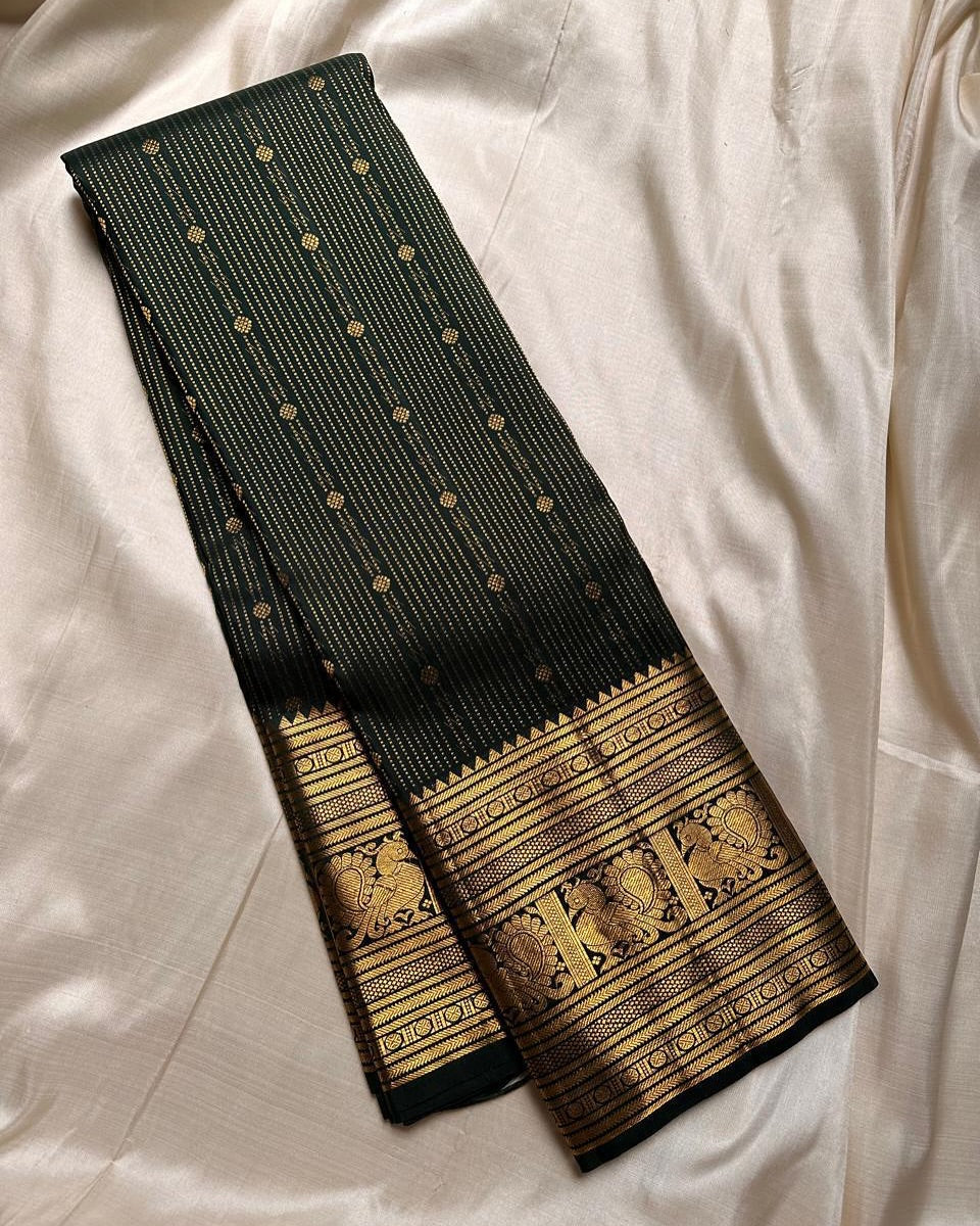 Ephemeral Dark Green Soft Banarasi Silk Saree With Amiable Blouse Piece