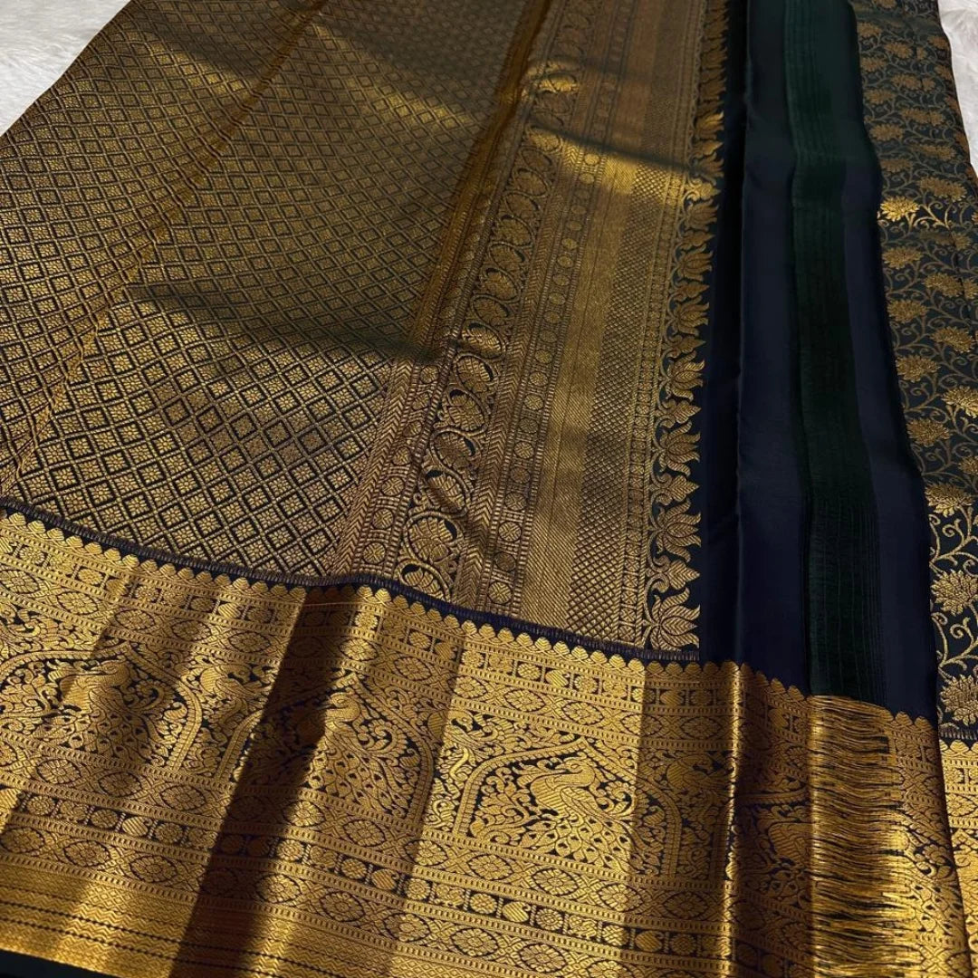 Divine Black Soft Banarasi Silk Saree With Delightful Blouse Piece