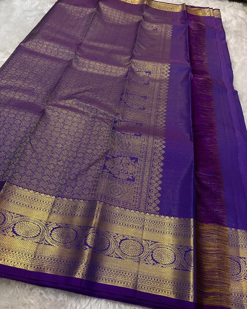 Ornate Purple Soft Banarasi Silk Saree With Ethereal Blouse Piece