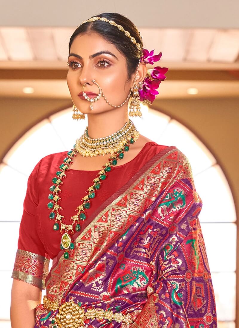 Demanding Purple Patola Silk Saree with Desiring Blouse Piece