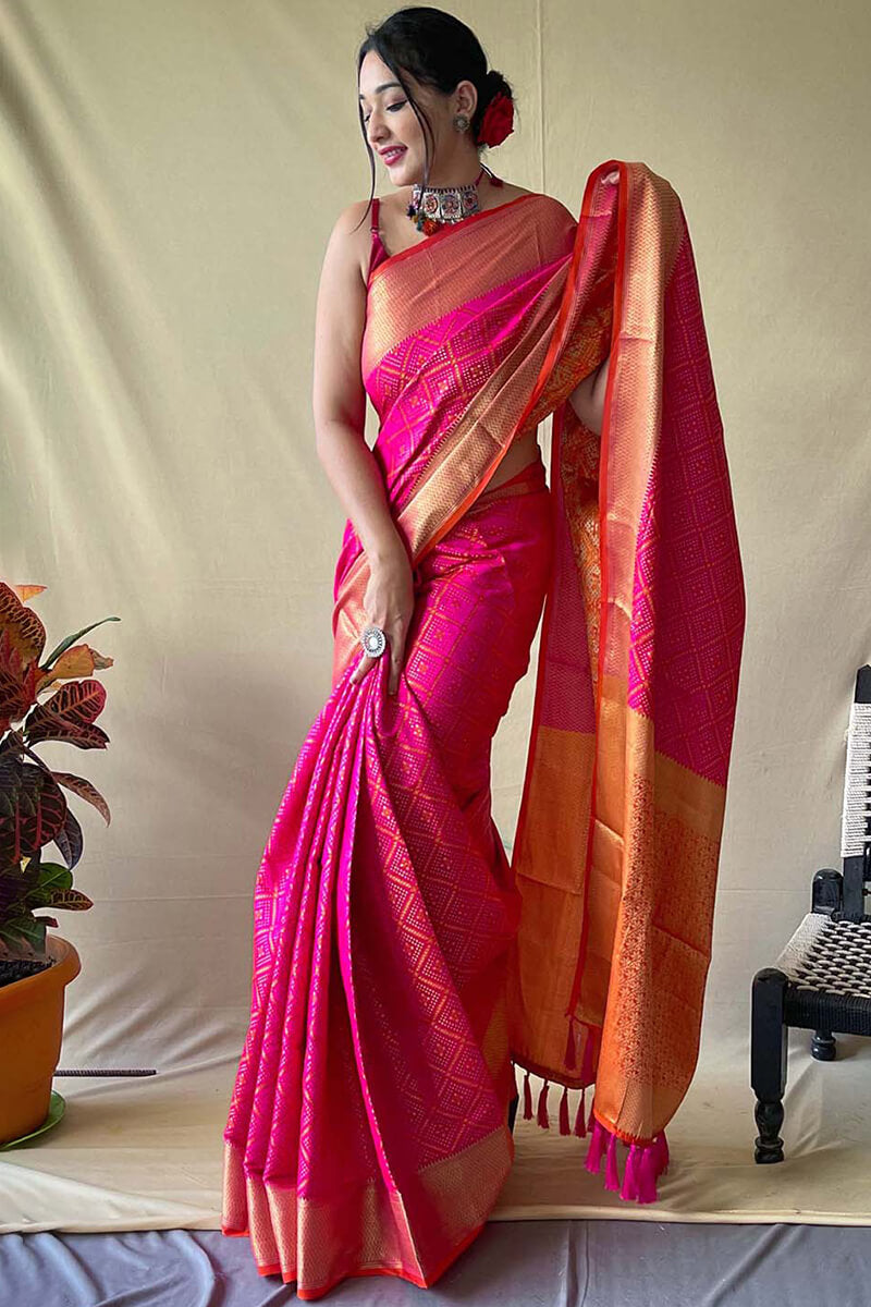 Fancifull Dark Pink Patola Silk Saree with Pretty Blouse Piece