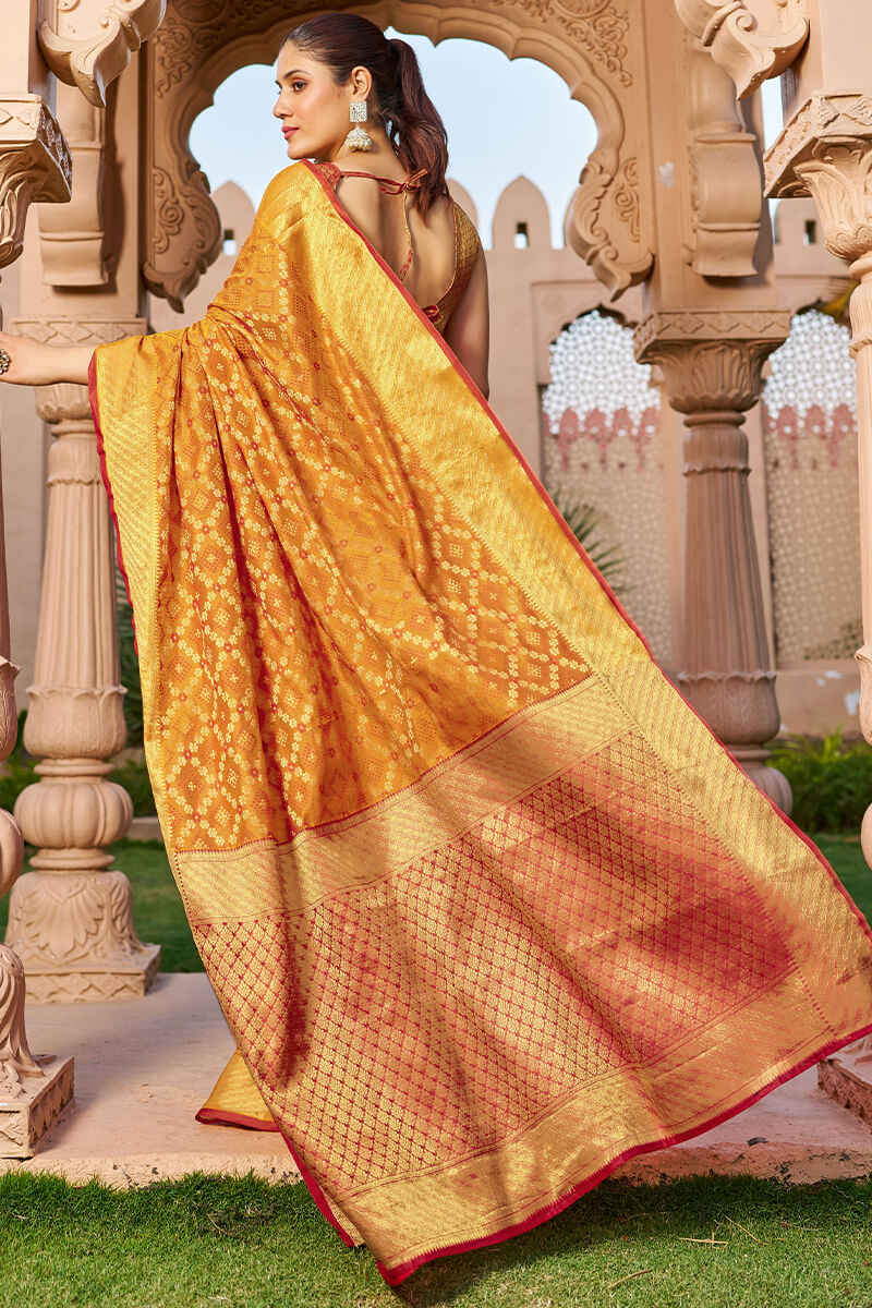 Unique Orange Patola Silk Saree with Appealing Blouse Piece
