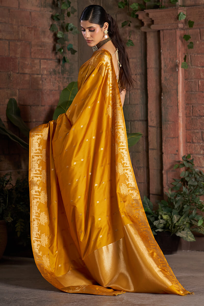Opulent Mustard Pure Zari Weaving Banarasi Silk Saree With Lassitude Blouse Piece