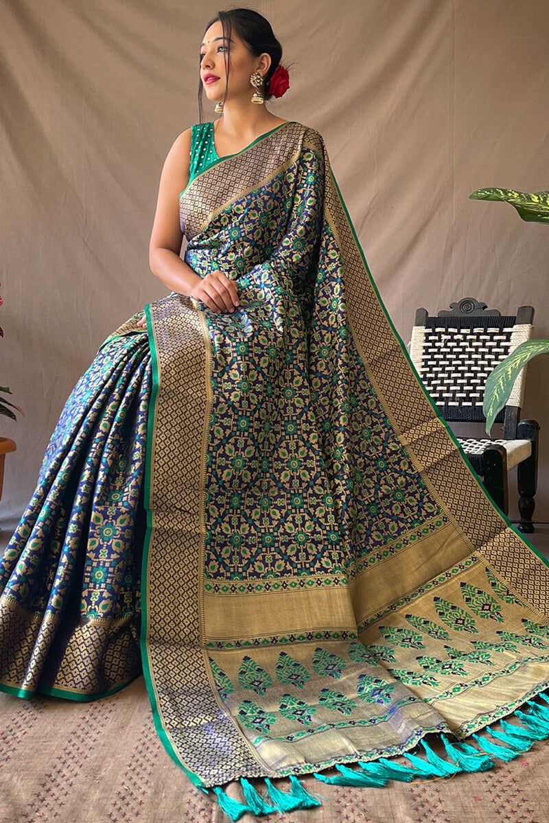 Precious Navy Blue Patola Silk Saree with Nectarous Blouse Piece