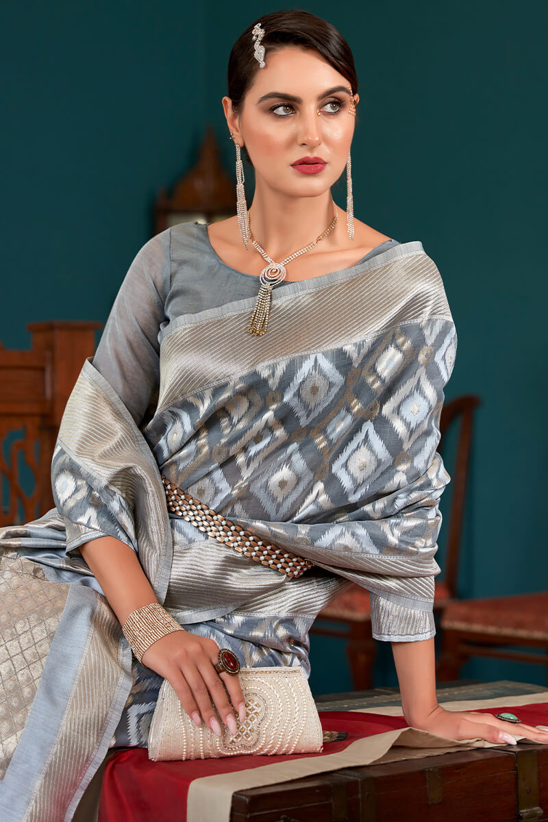 Scintillating Grey Cotton Silk Saree With Blooming Blouse Piece