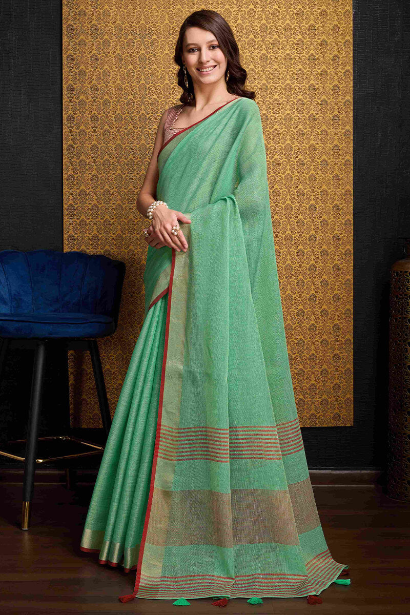 Deserving Sea Green Cotton Silk Saree With Ethereal Blouse Piece