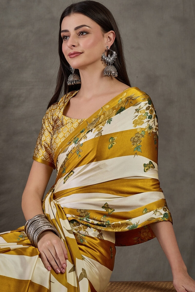 Super extravagant Mustard Ajrakh Printed Semi Modal Silk Saree With Demesne Blouse Piece