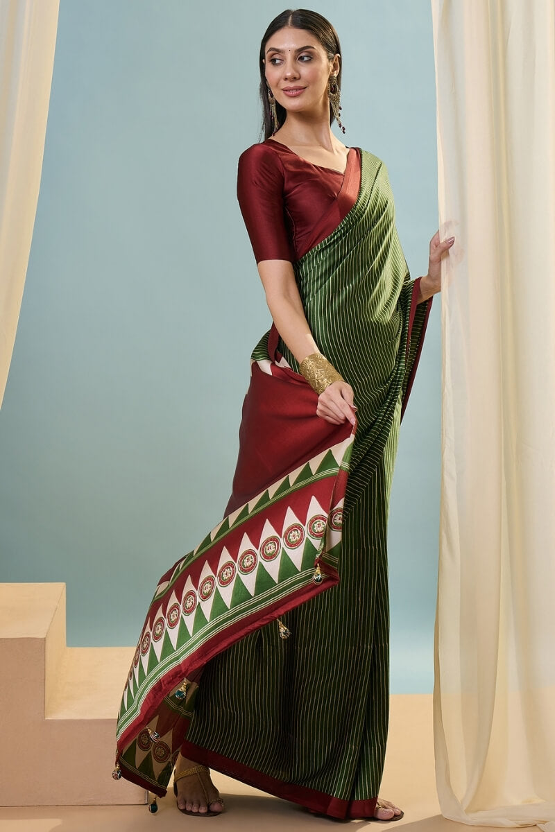 Transcendent Dark Green Ajrakh Printed Semi Modal Silk Saree With Winsome Blouse Piece
