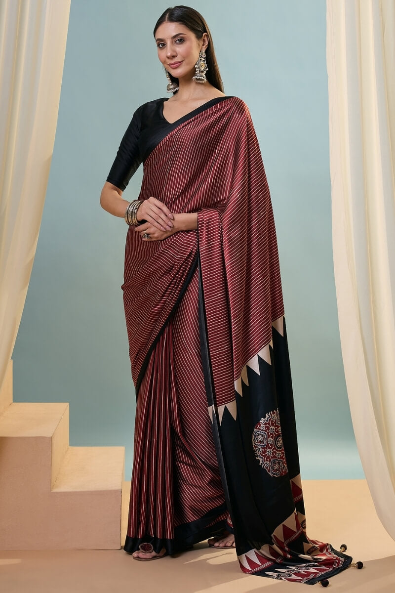Enthralling Maroon Ajrakh Printed Semi Modal Silk Saree With Desuetude Blouse Piece