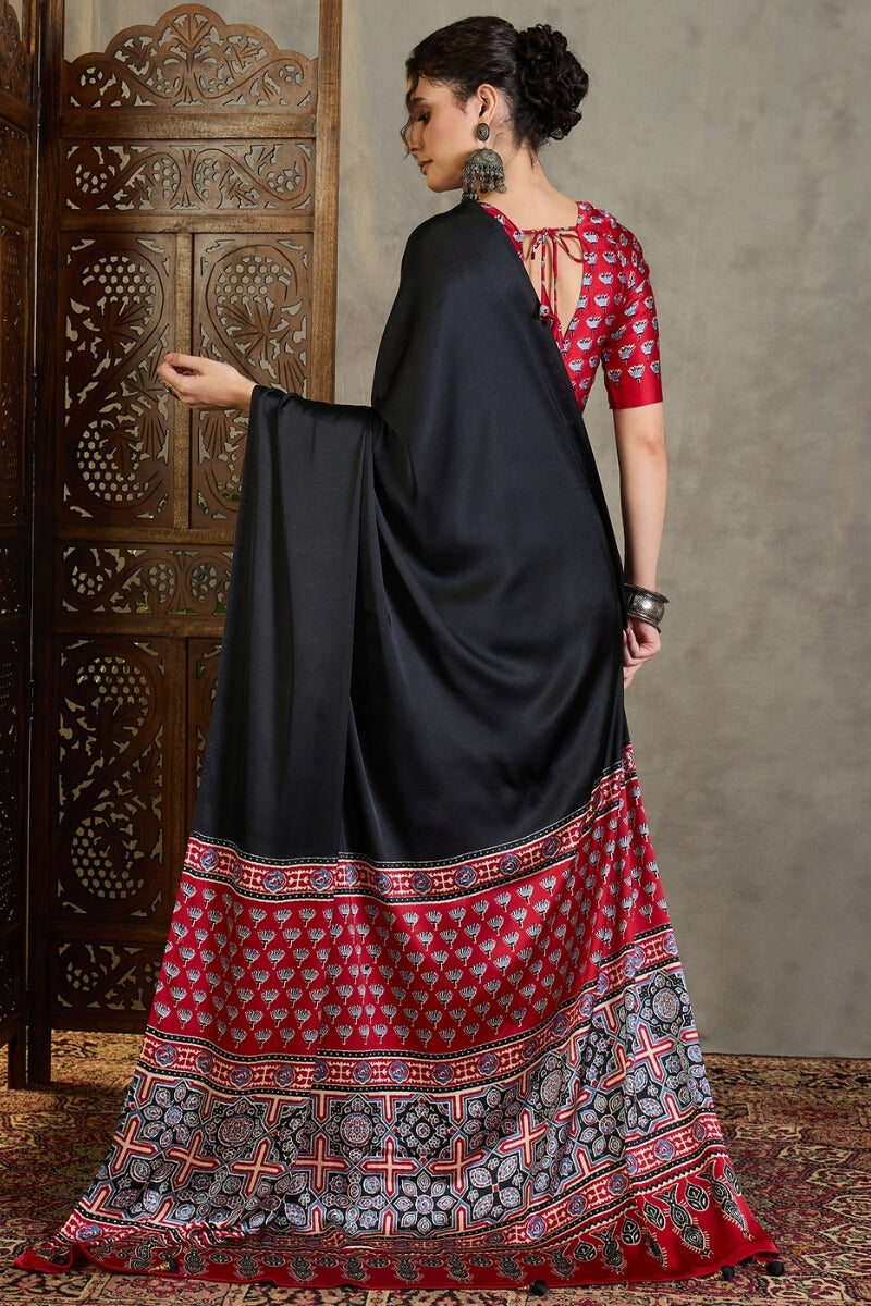 Effulgent Black Ajrakh Printed Semi Modal Silk Saree With Denouement Blouse Piece