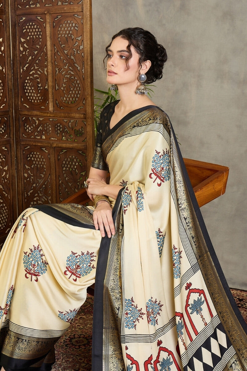 Pulsating Off White Ajrakh Printed Semi Modal Silk Saree With Forbearance Blouse Piece