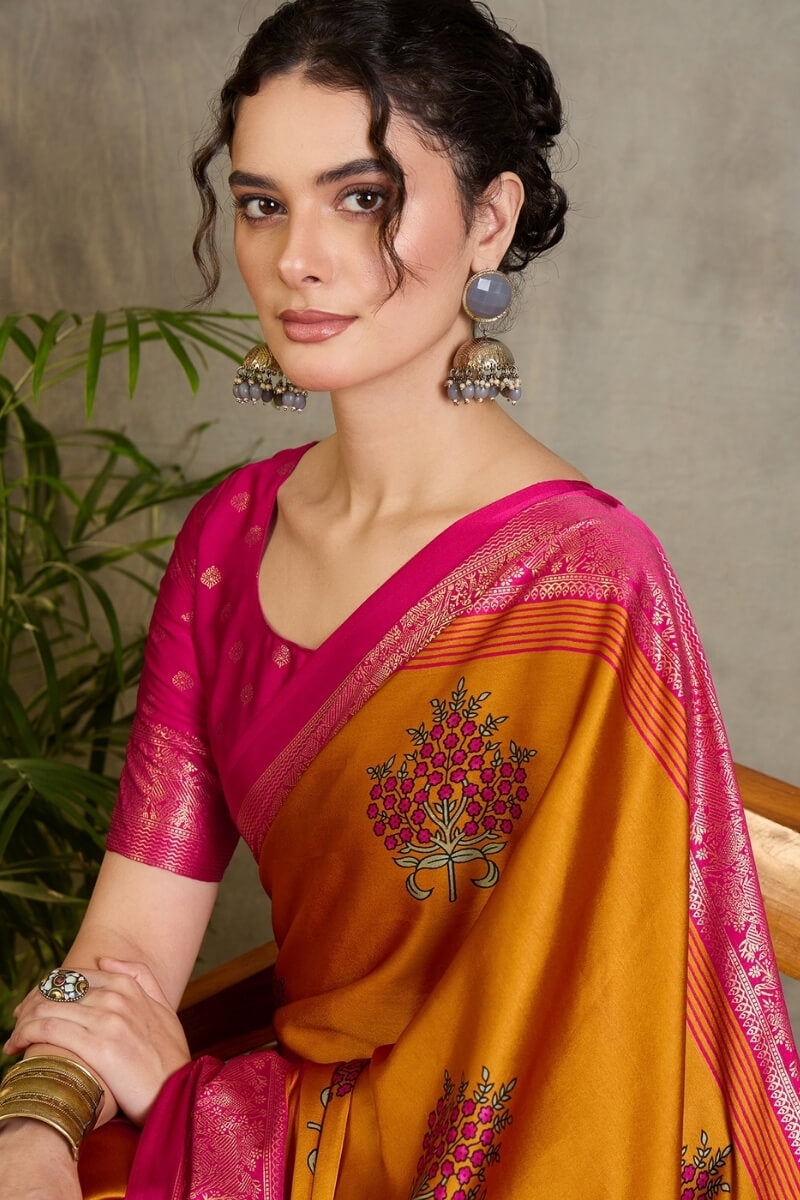 Amiable Mustard Ajrakh Printed Semi Modal Silk Saree With Gratifying Blouse Piece