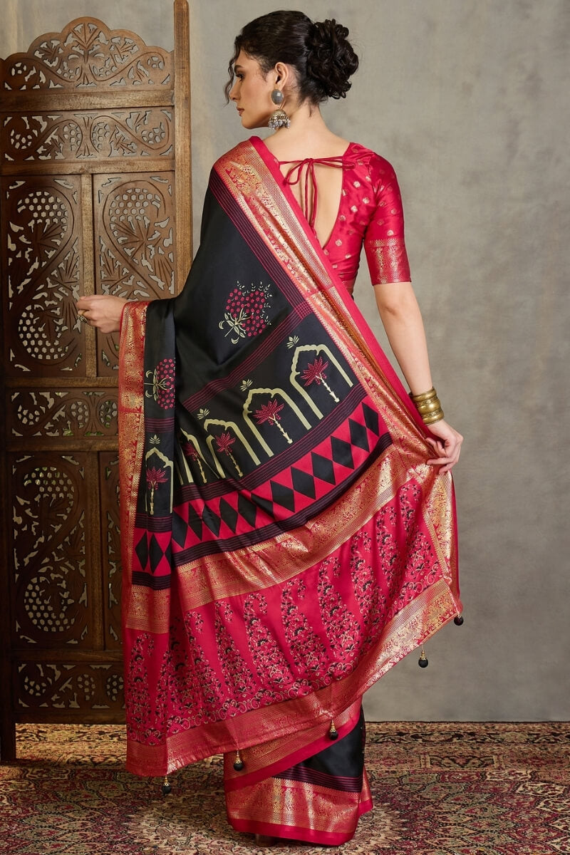 Adoring Black Ajrakh Printed Semi Modal Silk Saree With Nectarous Blouse Piece
