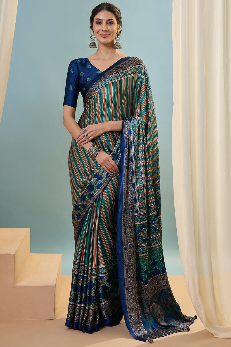 Sonorous Dark Green Ajrakh Printed Semi Modal Silk Saree With Breathtaking Blouse Piece