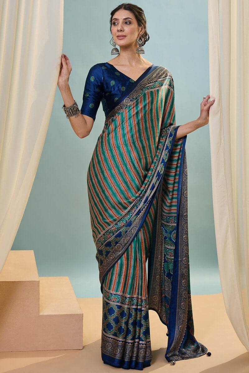Sonorous Dark Green Ajrakh Printed Semi Modal Silk Saree With Breathtaking Blouse Piece