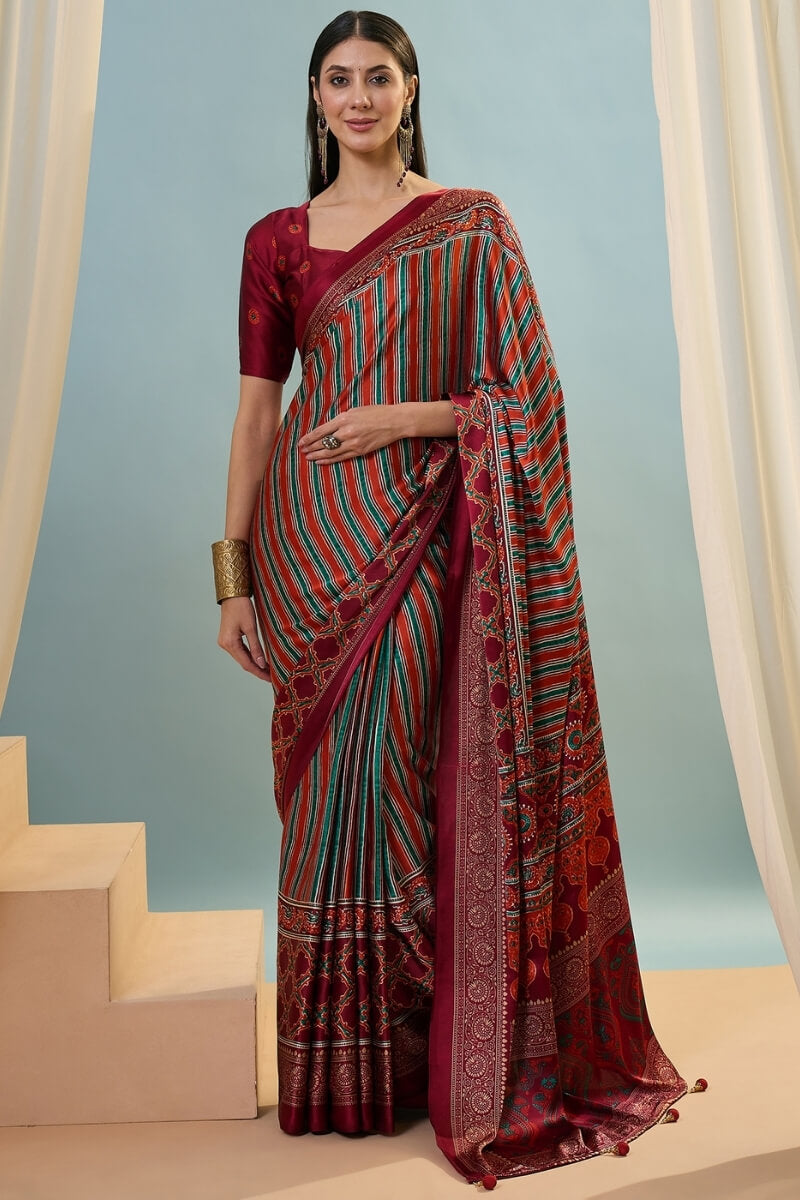 Enigmatic Red Ajrakh Printed Semi Modal Silk Saree With Blissful Blouse Piece