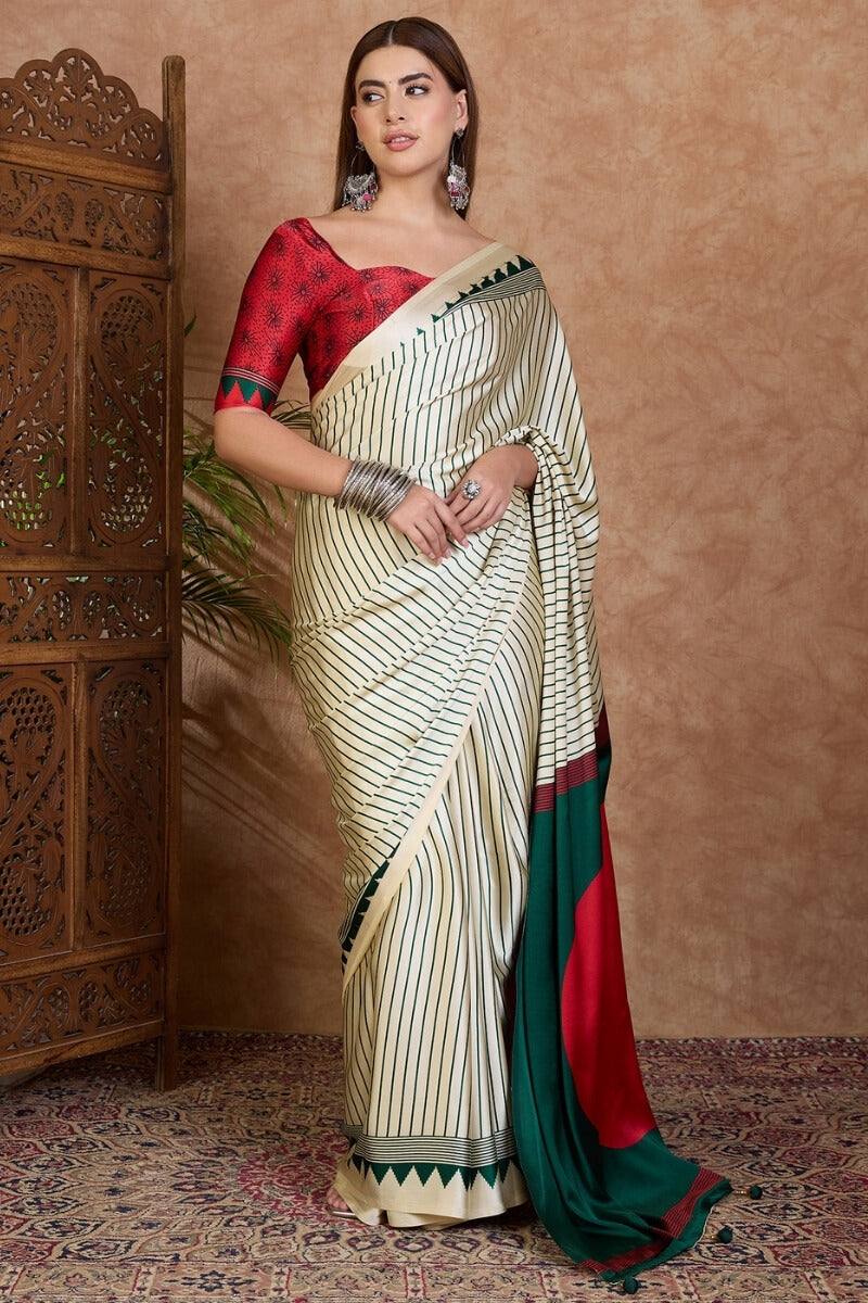Glittering Off White Ajrakh Printed Semi Modal Silk Saree With Quixotic Blouse Piece