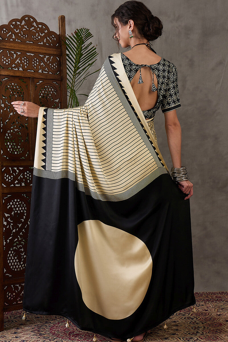 Alluring Beige Ajrakh Printed Semi Modal Silk Saree With Cynosure Blouse Piece