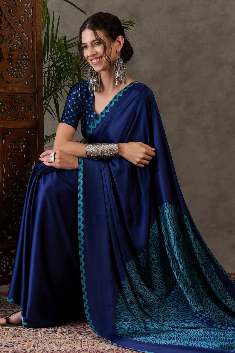 Whimsical Navy Blue Ajrakh Printed Semi Modal Silk Saree With Scrupulous Blouse Piece