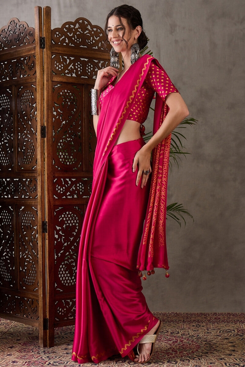 Appealing Dark Pink Ajrakh Printed Semi Modal Silk Saree With Elision Blouse Piece
