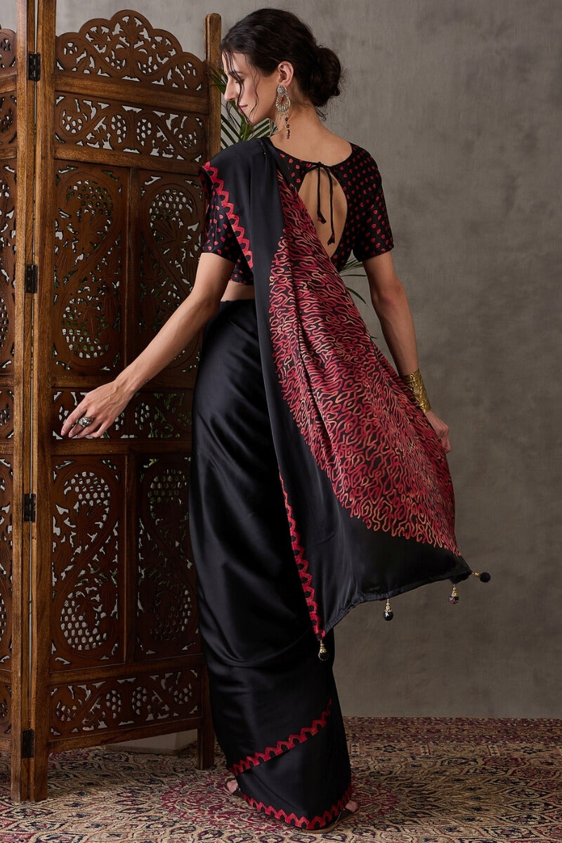Super classy Black Ajrakh Printed Semi Modal Silk Saree With Symmetrical Blouse Piece