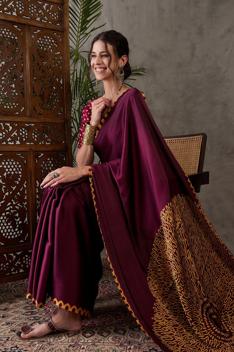 Beleaguer Wine Ajrakh Printed Semi Modal Silk Saree With Skinny Blouse Piece