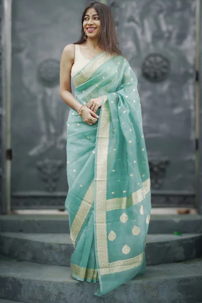 Moiety Turquoise Banarasi Silk Saree With Panoply Blouse Piece