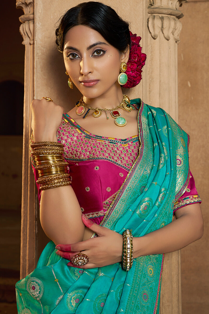 Nectarous Turquoise Banarasi Satin Silk Saree With Glowing Blouse