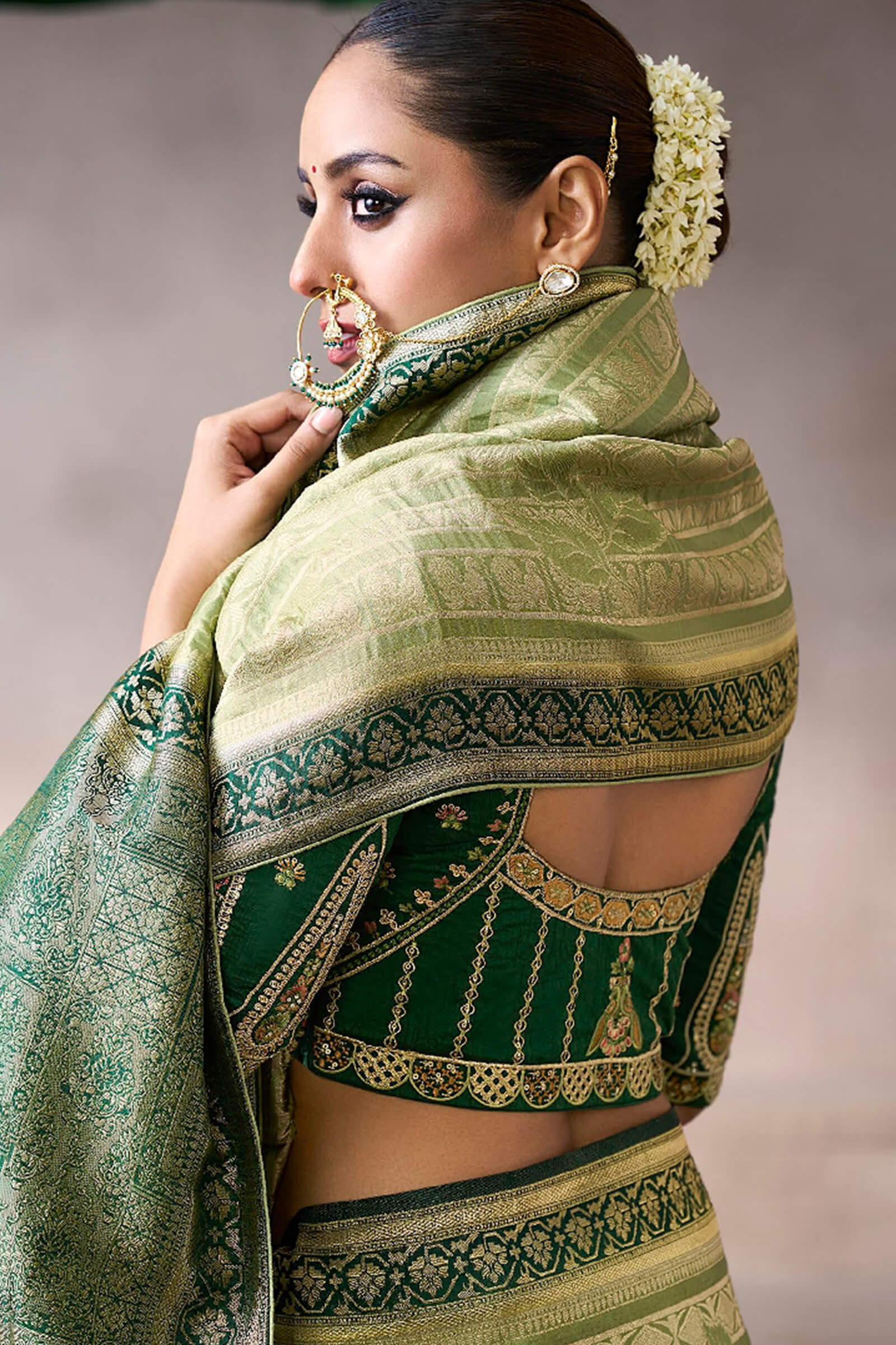 Flamboyant Green Banarasi Satin Silk Saree With Traditional Blouse