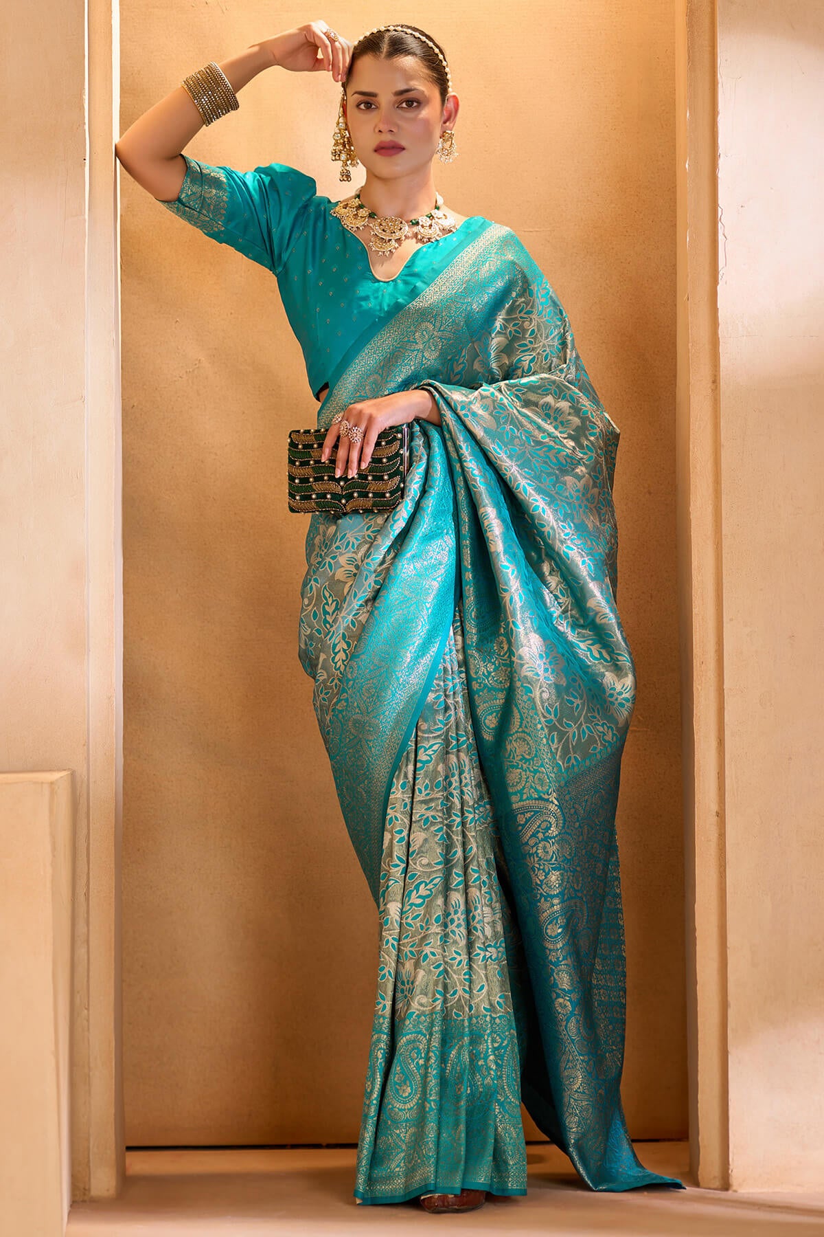 Sempiternal Firozi Kanjivaram Silk Saree With Unique Blouse Piece