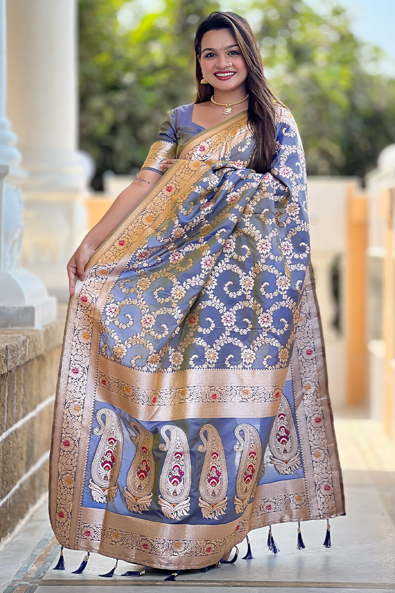 Staring Grey Soft Banarasi Silk Saree With Blooming Blouse Piece