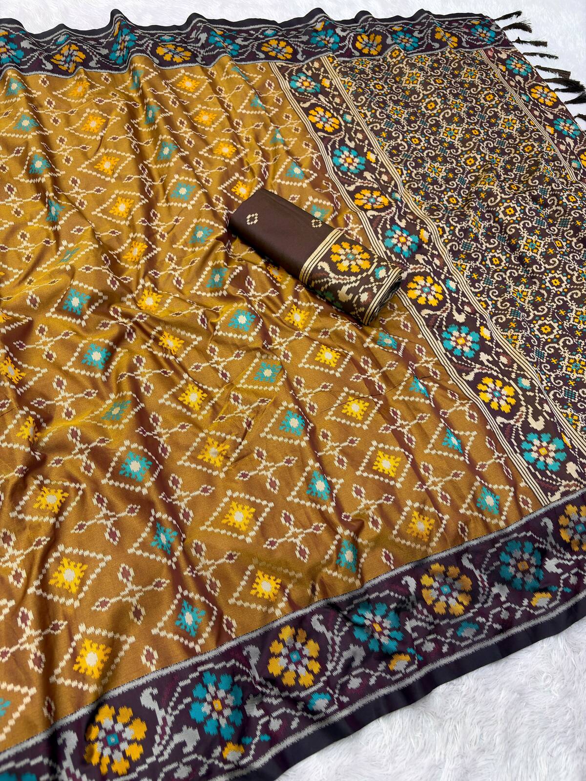 Luxuriant Mustard Patola Silk Saree with Exquisite Blouse Piece