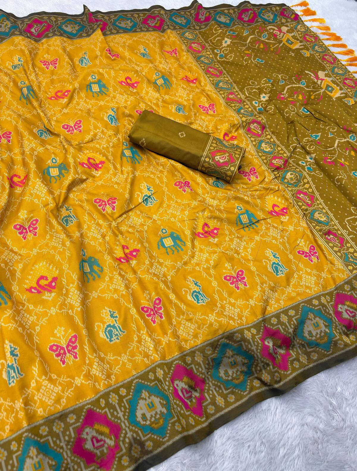 Excellent Yellow Patola Silk Saree with Nectarous Blouse Piece