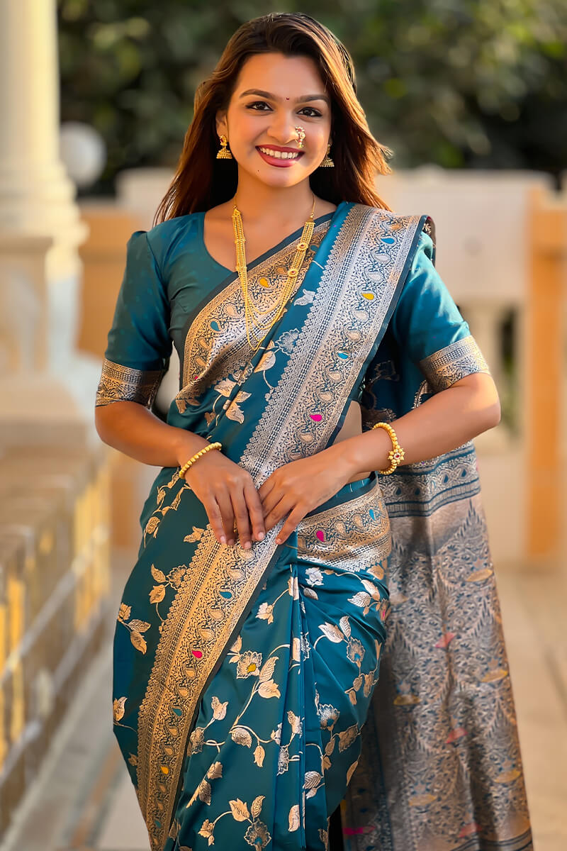 Ineffable Teal Blue Soft Banarasi Silk Saree With Zephyr Blouse Piece