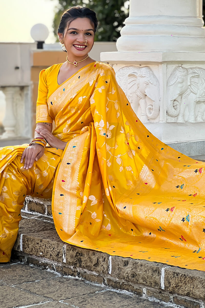 Opulent Yellow Soft Banarasi Silk Saree With Diaphanous Blouse Piece