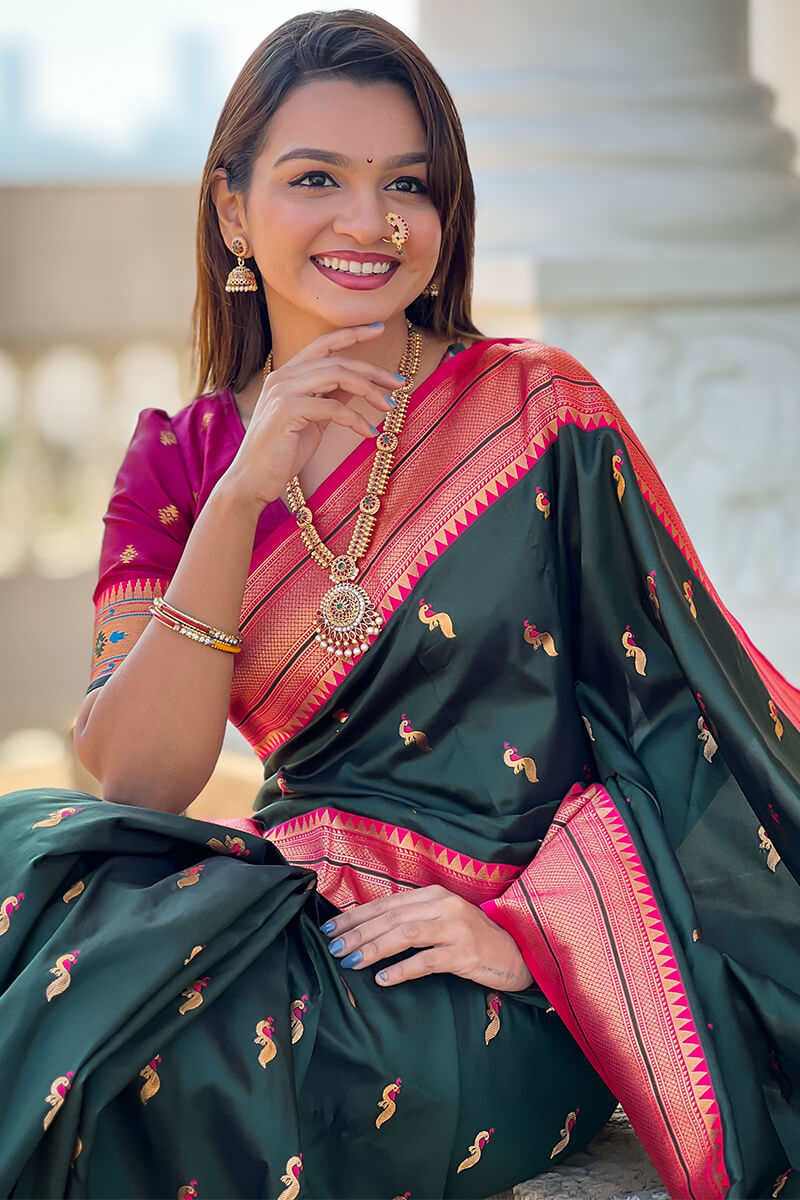 Impressive Dark Green Paithani Silk Saree With Adorning Blouse Piece