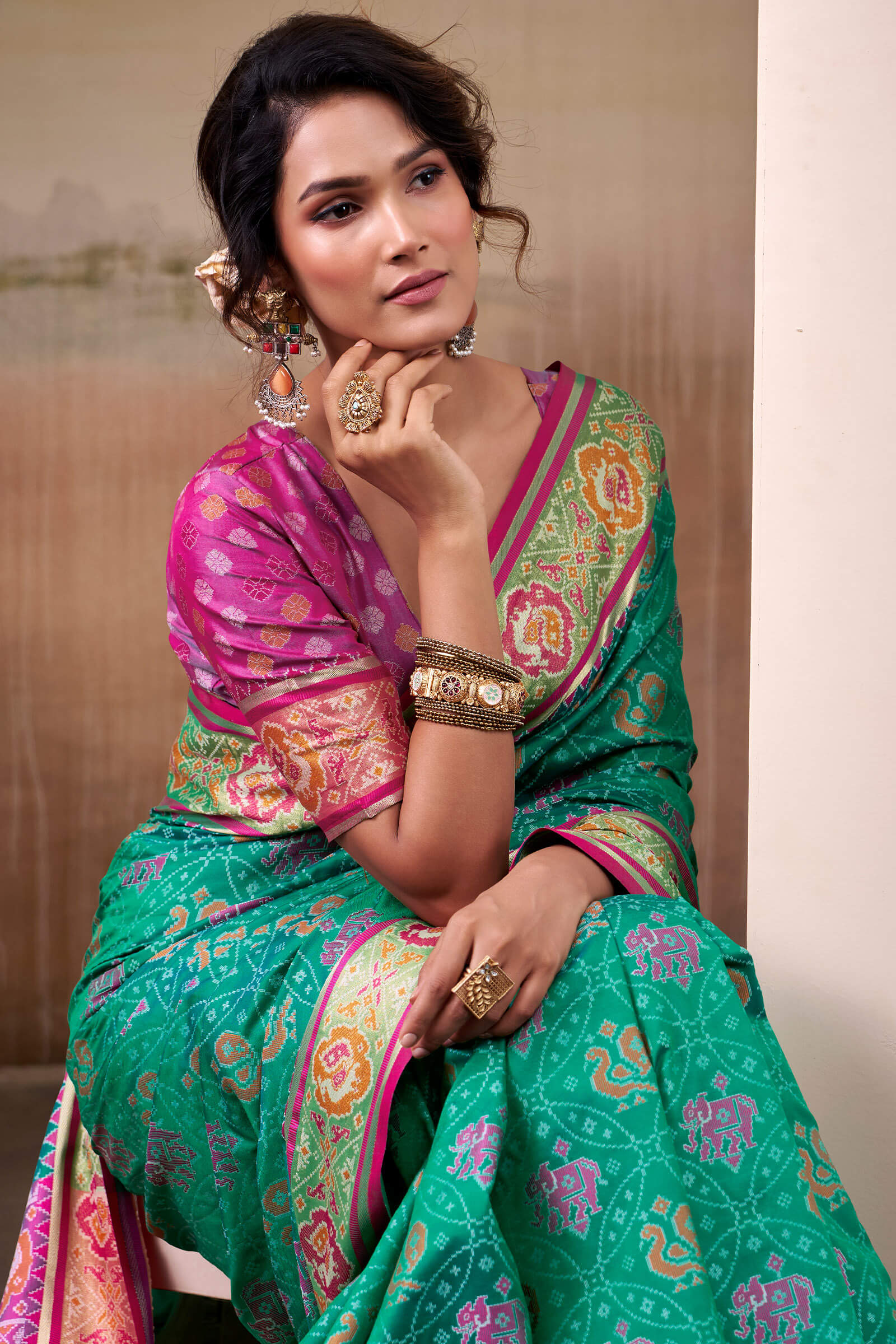 Radiant Rama Patola Silk Saree With Effulgent Blouse Piece