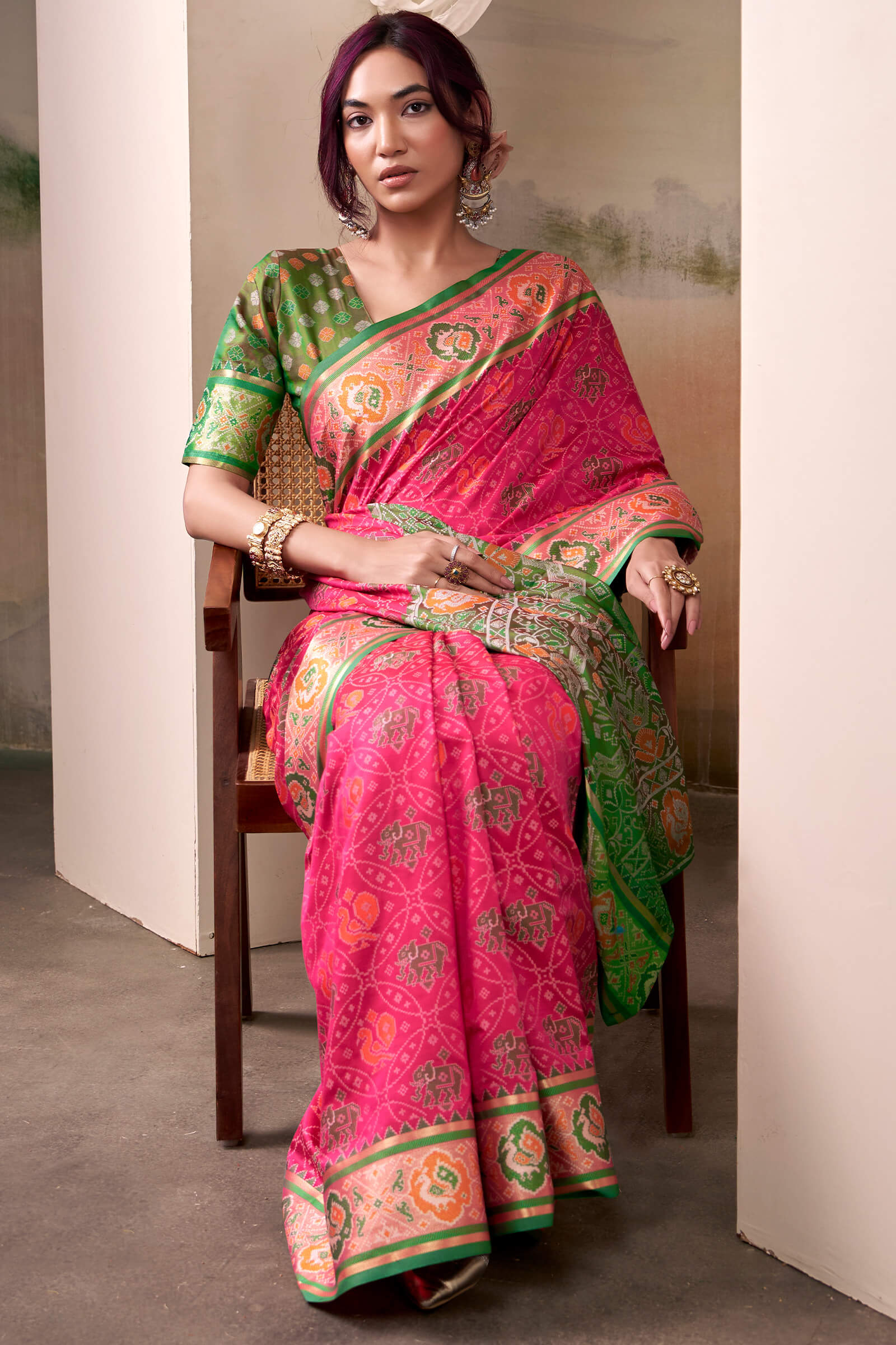 Amiable Pink Patola Silk Saree With Flamboyant Blouse Piece