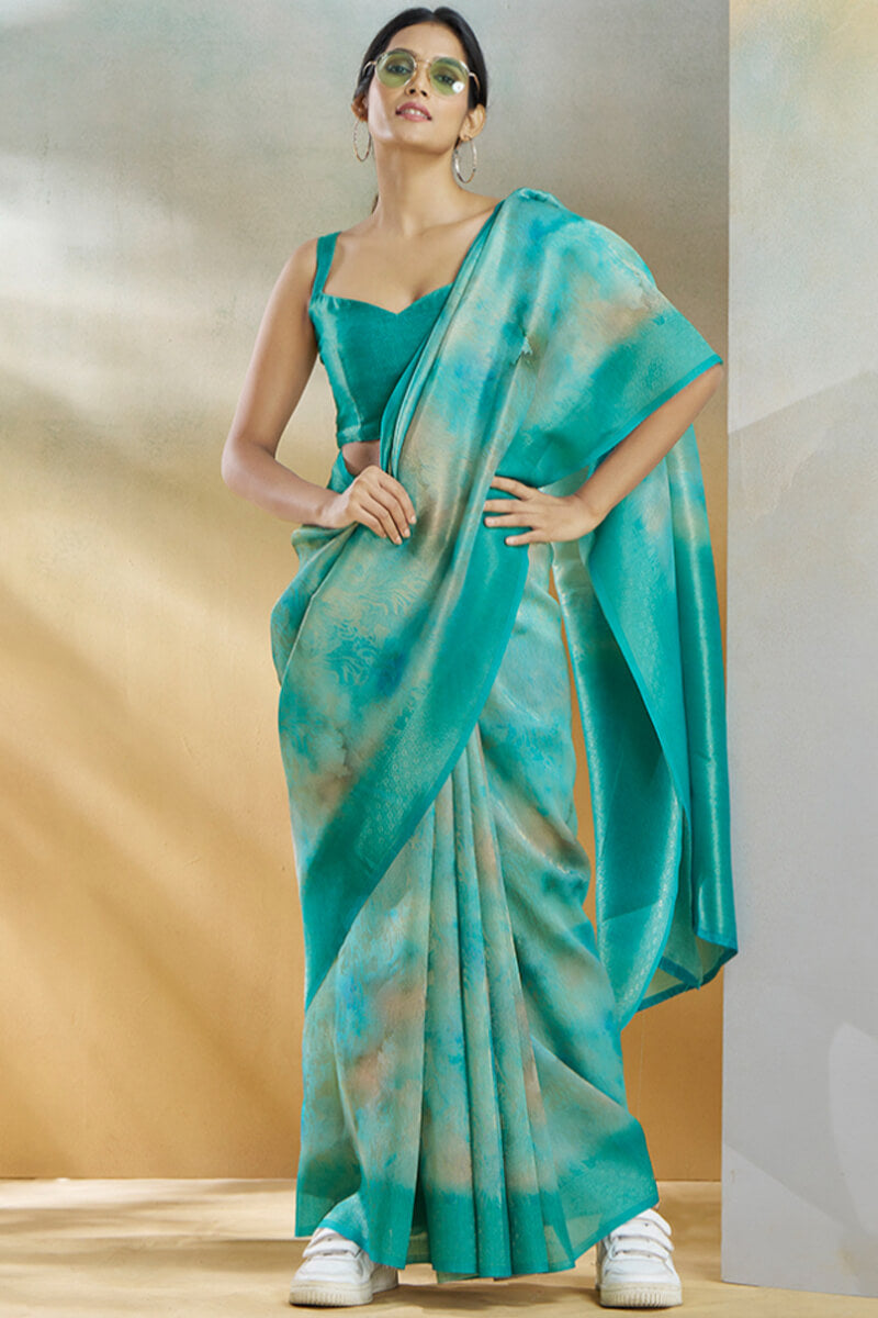Beguiling Turquoise Digital Printed Soft Silk Saree With Alluring Blouse Piece